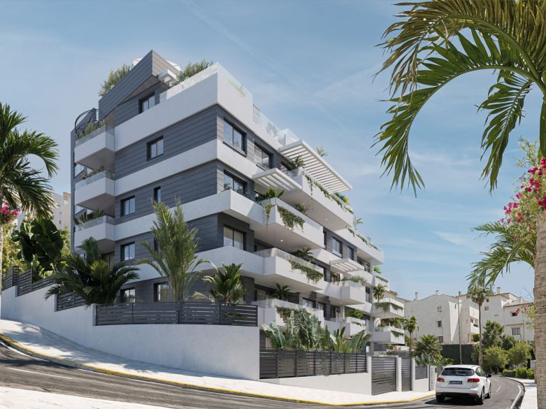 Modern luxury apartments in Marbella with pool and mountain views, showcasing the lifestyle and residential appeal that attracts international buyers in 2026.