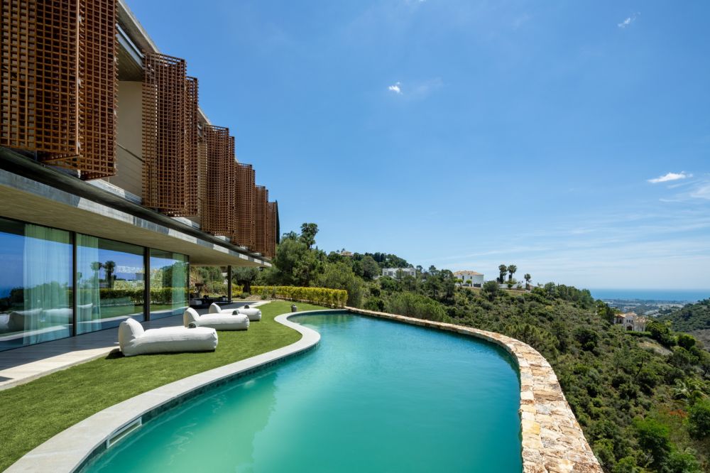 Refined living in a modern masterpiece villa newly built in the hills of Benahavis!