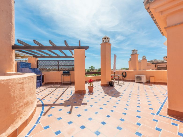 Exquisite beachside penthouse boasting a sprawling solarium terrace!