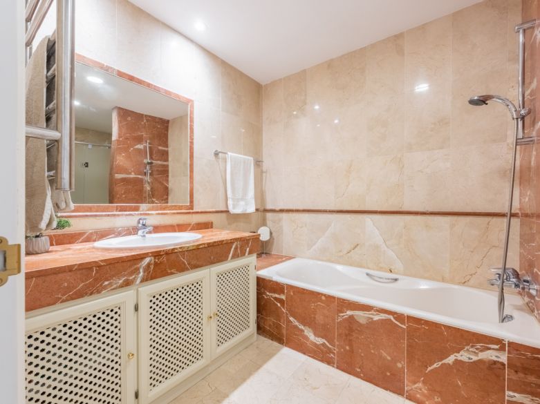 Exquisite beachside penthouse boasting a sprawling solarium terrace!