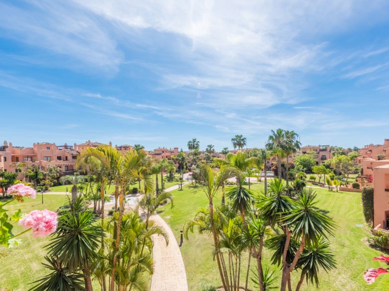 Exquisite beachside penthouse boasting a sprawling solarium terrace!