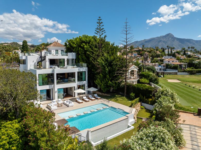 Frontline golf villa with indoor pool, golf and sea views and much more!