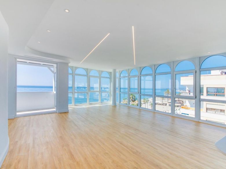 Stunning, south-facing fully renovated, three bedroom beachfront apartment in the heart of Estepona’s charming Old Town