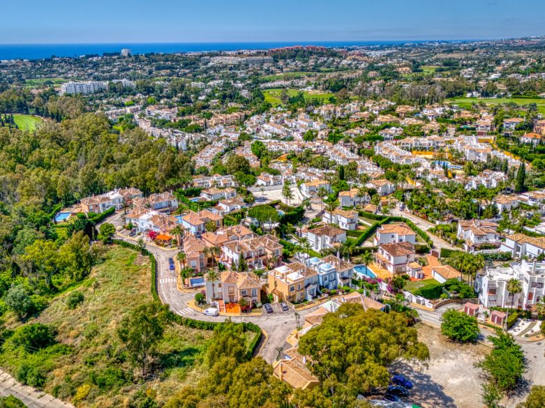 Elegant two bedroom, south west facing townhouse set within an exclusive gated community of Nueva Andalucia, Marbella