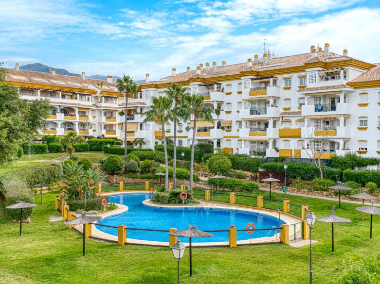 Charming three bedroom, ground floor apartment located in the sought-after community of Pinos de Nagüeles, in Marbella’s prestigious Golden Mile