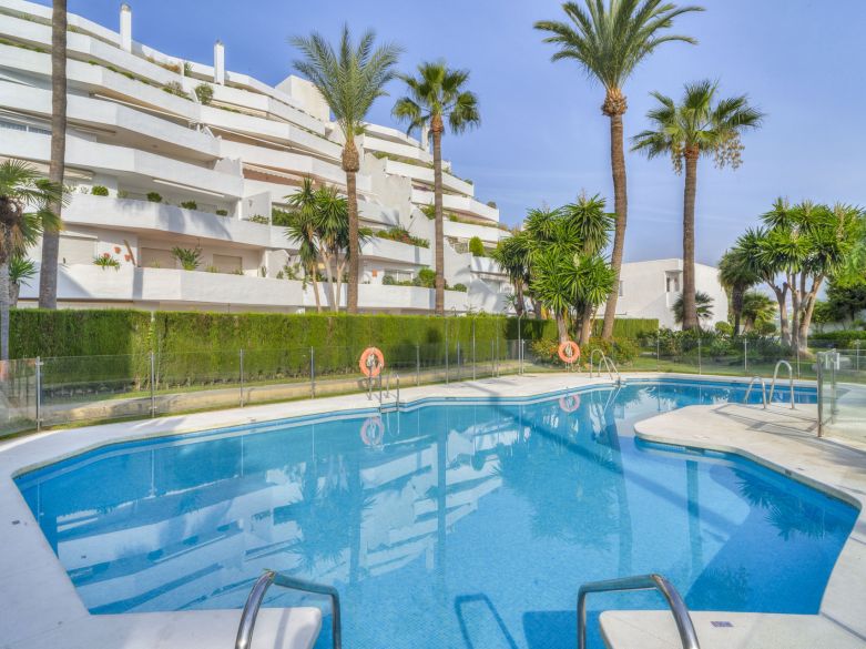 Beautifully reformed two bedroom apartment in the gated community of Jardines de Andalucía, Nueva Andalucia
