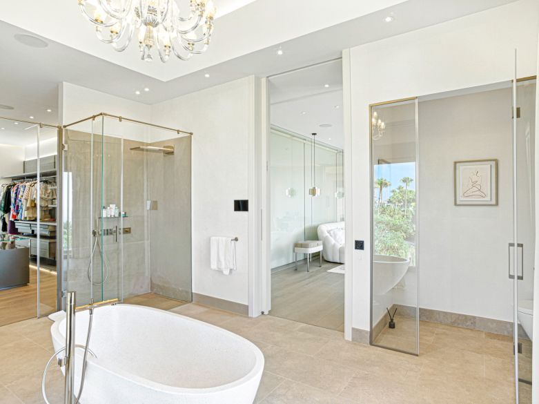 An architecturally unique, south-facing property located in the exclusive gated community of Sierra Blanca on Marbella’s prestigious Golden Mile