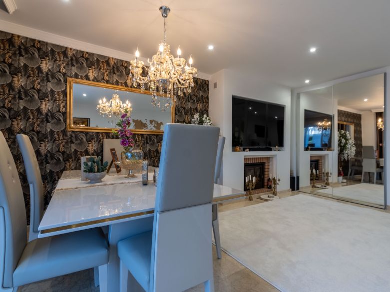 Modern South-Facing Townhouse with Premium Finishes – Move-In Ready
