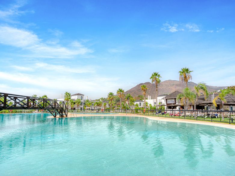 Stylish south-facing three bedroom apartment with spectacular sea views, located in the prestigious Mirador de Estepona Hills