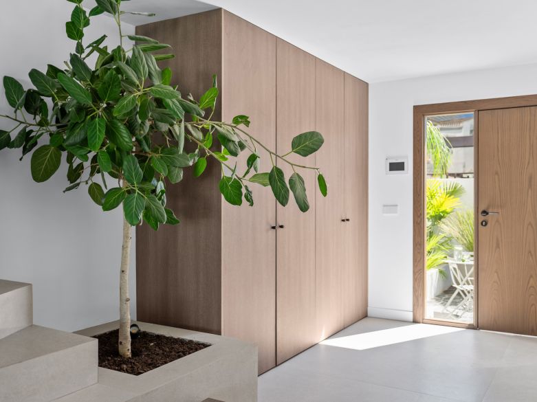 Elegante adosado con piscina privada en Nueva Andalucía