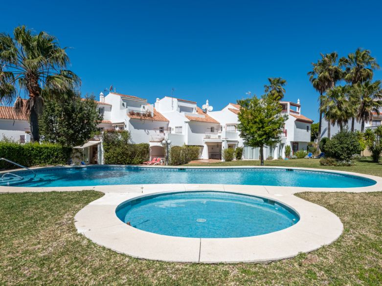 Spacious 4-Bedroom Townhouse with Garden and Pool Access in Monte Biarritz, Near Marbella & Estepona